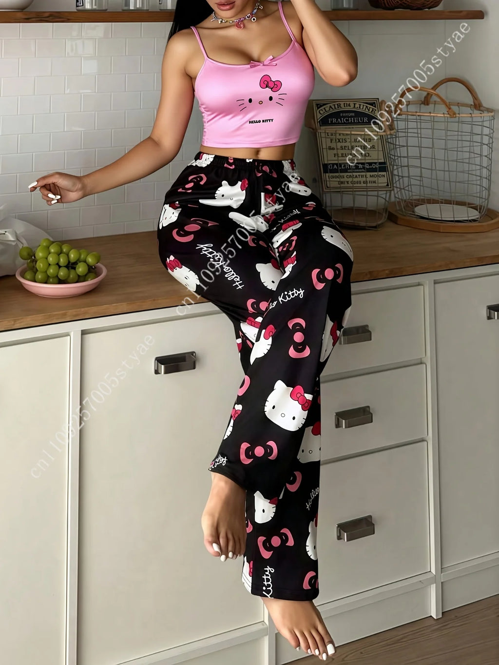 2pcs Sanrio Hello Kitty Pajama Set Features A Women'S Halter Neck Top with An Off The Shoulder Style and Black Pants